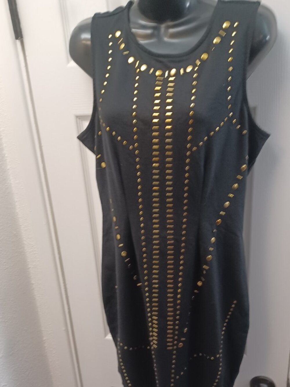 Nicki Minaj Black dress with gold studs #studded #edgy #party